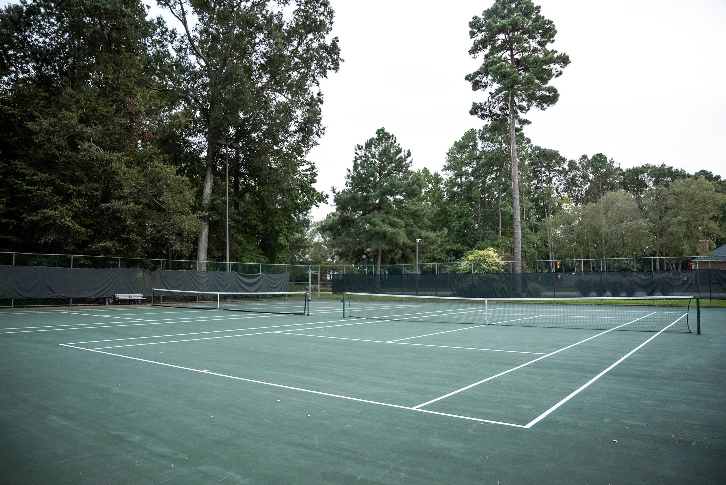 Professional-grade tennis courts at Kiln Creek Golf Club & Resort, perfect for matches, lessons, and league play.